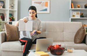 Top 10 Frugal Habits to Save Money girl stressed about her spendings