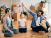 8 Habits That Will Make You Happier at Home family sitting happily at home