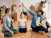 8 Habits That Will Make You Happier at Home family sitting happily at home