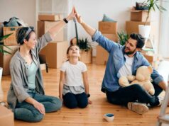 8 Habits That Will Make You Happier at Home family sitting happily at home