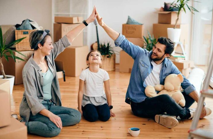 family sitting happily at home